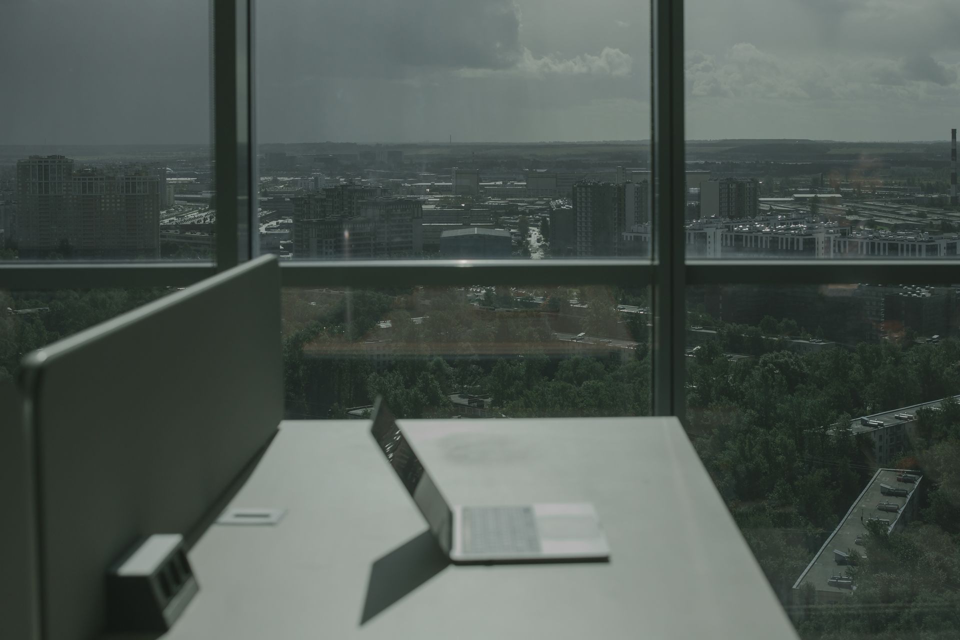 A desk in the firm's office with the city beyond